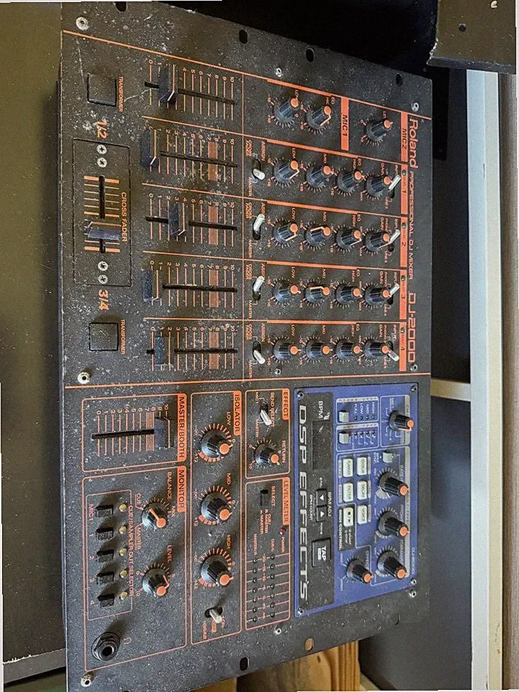 Roland DJ-2000 Professional 4-Channel DJ Mixer with DSP Effects and MIDI Sync